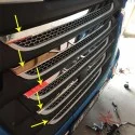 Baguettes inox sur grille de calandre Daf XF 106